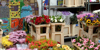 Mar de flores de domingo en Columbia Road