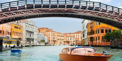 Go out by yourself on the Venetian canals