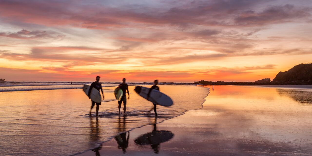 Surfing at sunset 