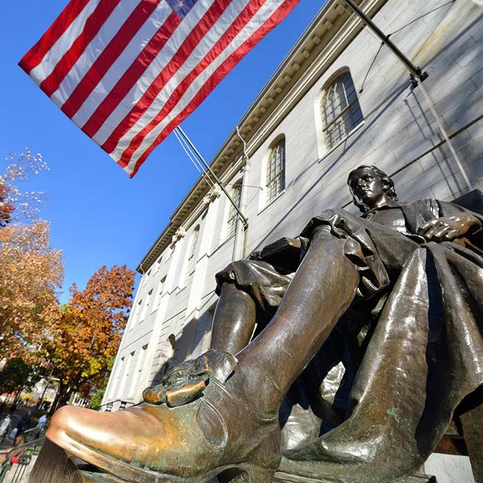 John Harvard’s worn down left shoe
