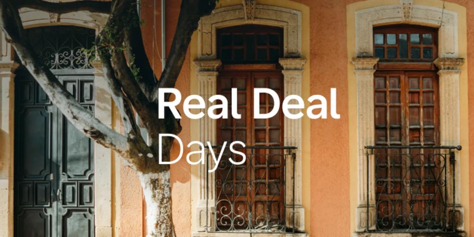 Wooden doors with Real Deal Days text