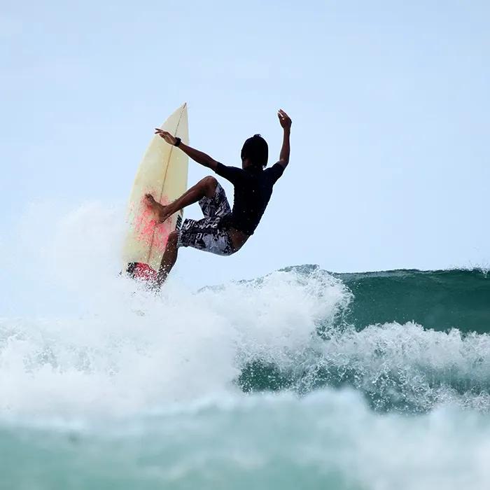 Head to Kuta for some serious wave surfing