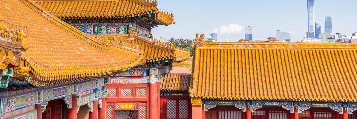 Modern skyline and historic Forbidden City in Beijing, China